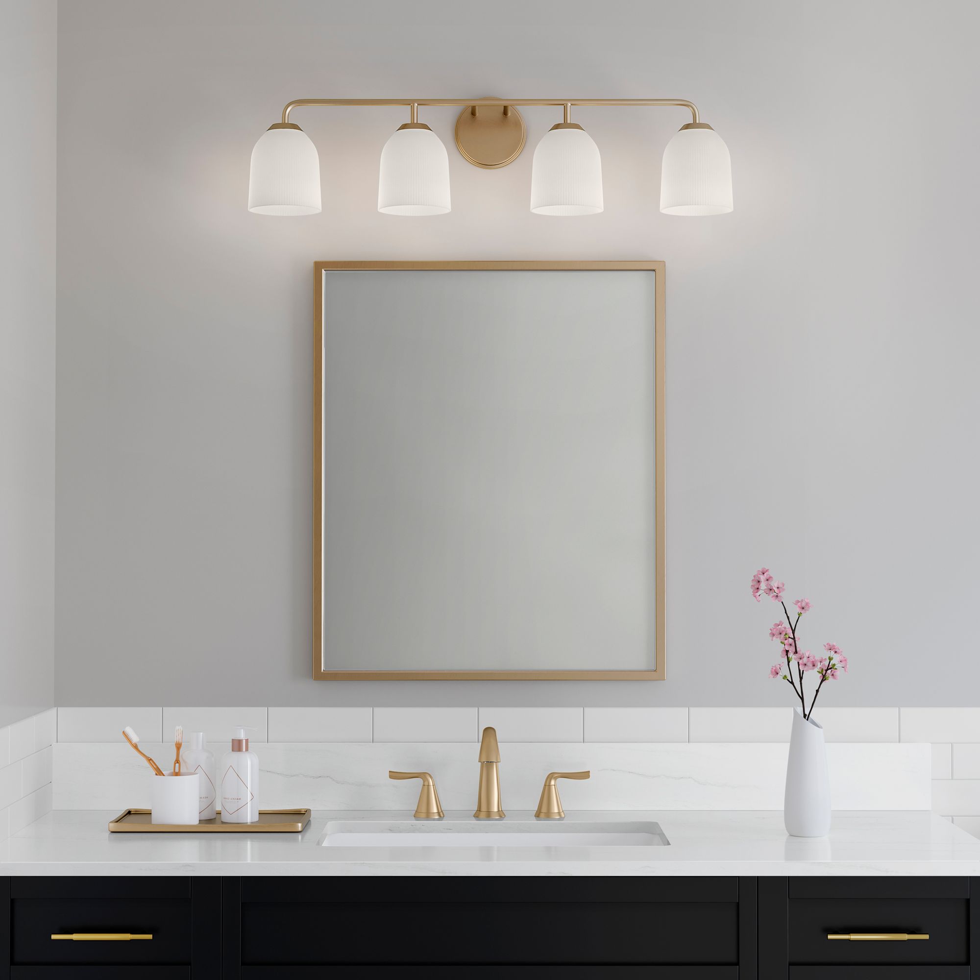 Millennium Norah 4-Light 32" Vintage Brass Vanity Light with Glass Shade