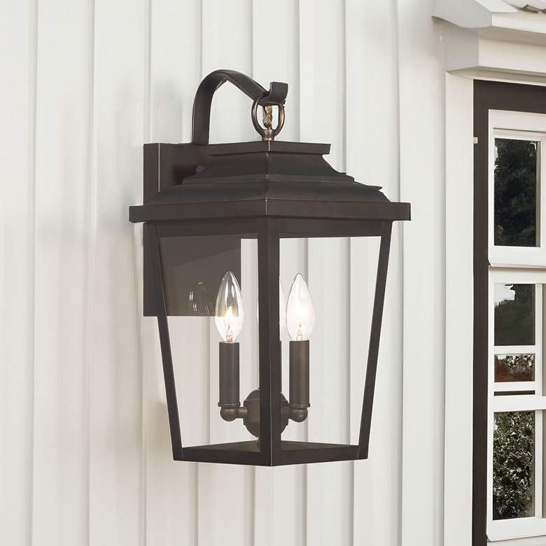 Image 1 Minka Irvington Manor 16 3/4" High Bronze 3-Light Outdoor Wall Light