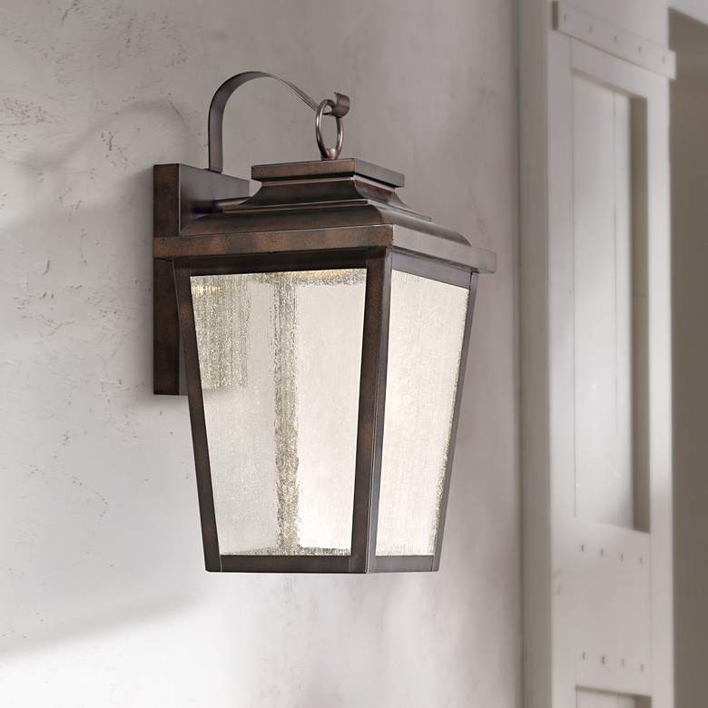 Image 1 Minka Irvington Manor 16 3/4" High Bronze LED Outdoor Wall Light