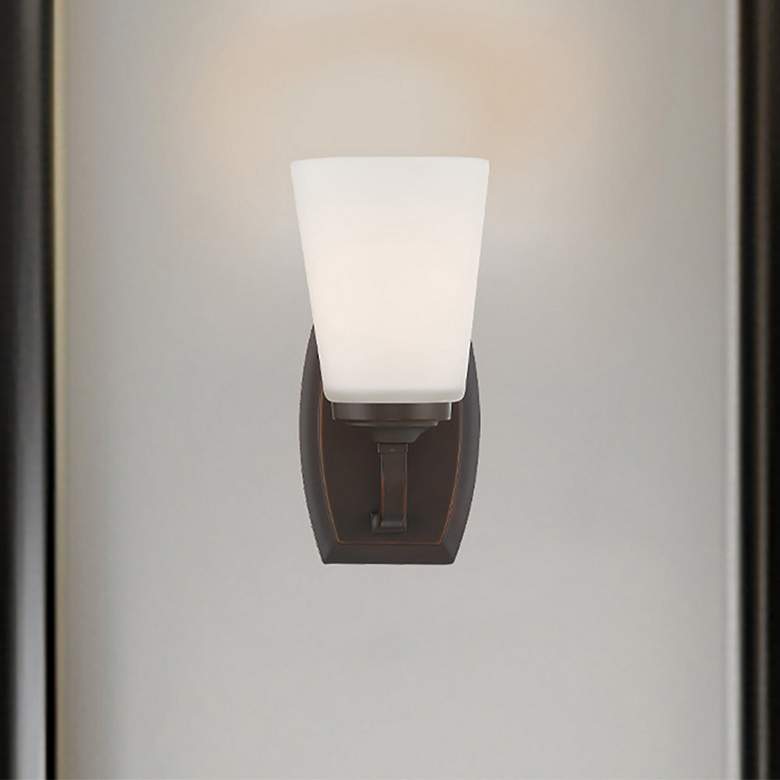 Image 1 Minka Overland Park 9" High Vintage Bronze Wall Sconce