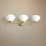 Thumbnail1 of Mitzi Valerie 21 3/4" Modern Opal Glass Aged Brass 3-Light Bath Light