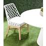 Monterey 55" Wide Ivory Outdoor Round Dining Table in scene