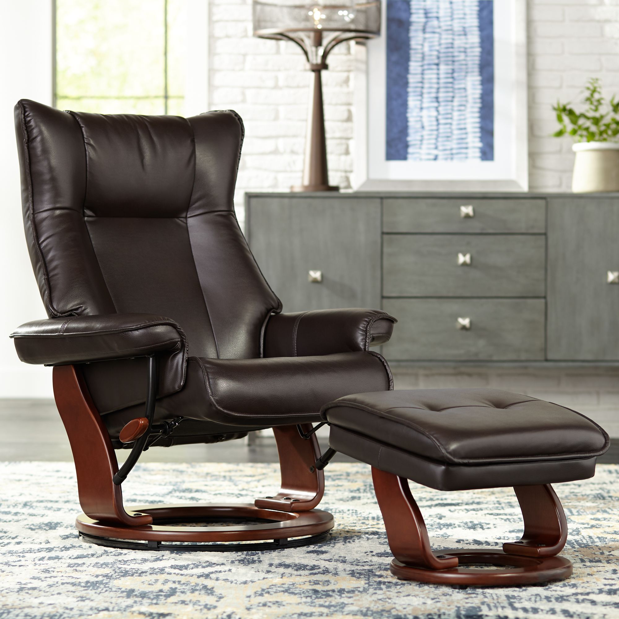 Faux leather glider recliner with ottoman hot sale