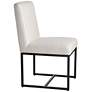 Myles Off-White Fabric and Black Metal Dining Chair in scene