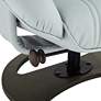 Thumbnail4 of Newport Sky Blue Faux Leather Swivel Recliner and Slanted Ottoman more views