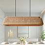 1_Nido 54" Wide Matte Black and Natural Rope Linear Pendant