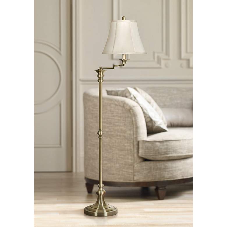 Image 1 Nora 62 inch High Antique Brass Adjustable Swing Arm Floor Lamp