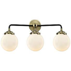 Image1 of Nouveau Beacon 6" 3 Light 24" Bath Light - Black Brass - White Sh