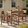 Nova 5-Piece Outdoor Bar Table with 4 Counter Stools in scene