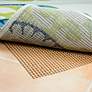 Thumbnail2 of OutdoorGrip 0007C 3'8"x5'4" Brown All-Weather Rug Pad more views