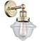 Oxford 10"High Antique Brass Sconce With Clear Shade