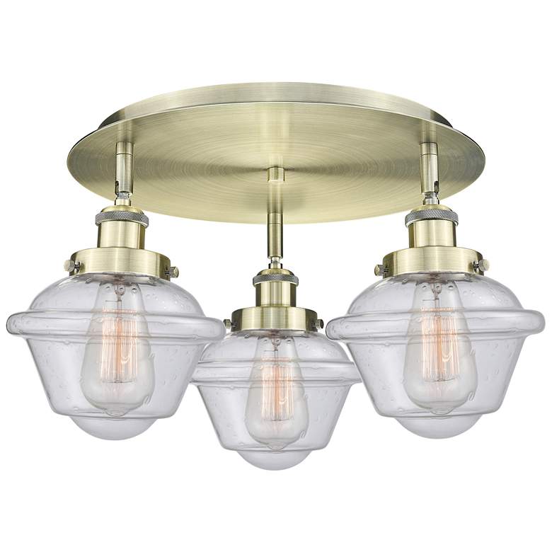 Image 1 Oxford 18.25" Wide 3 Light Antique Brass Flush Mount With Seedy Glass