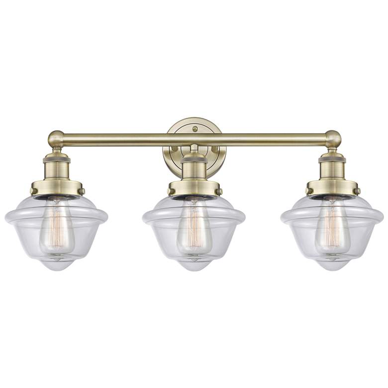 Image 1 Oxford 24.5" Wide 3 Light Antique Brass Bath Vanity Light With Clear S