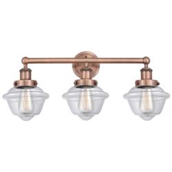 Oxford 24.5&quot; Wide 3 Light Antique Copper Bath Vanity Light With Clear