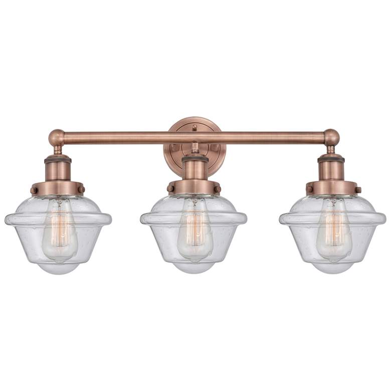 Image 1 Oxford 24.5" Wide 3 Light Antique Copper Bath Vanity Light With Seedy