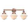 Oxford 24.5"W 3 Light Antique Copper Bath Vanity Light With White Shad