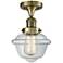 Oxford 7.5" Wide Antique Brass Semi Flush Mount w/ Clear Shade
