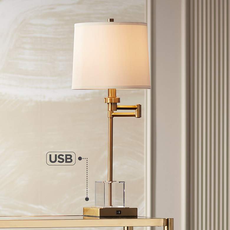 Image 1 Pacific Coast Lighting Carnegie Acrylic and Warm Gold Swing Arm Table Lamp