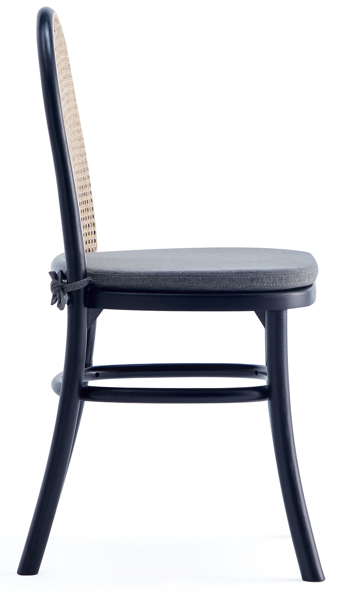 Paragon Matte Black Wood Natural Cane Dining Chairs Set of 4 in scene