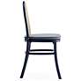 Paragon Matte Black Wood Natural Cane Dining Chairs Set of 4 in scene