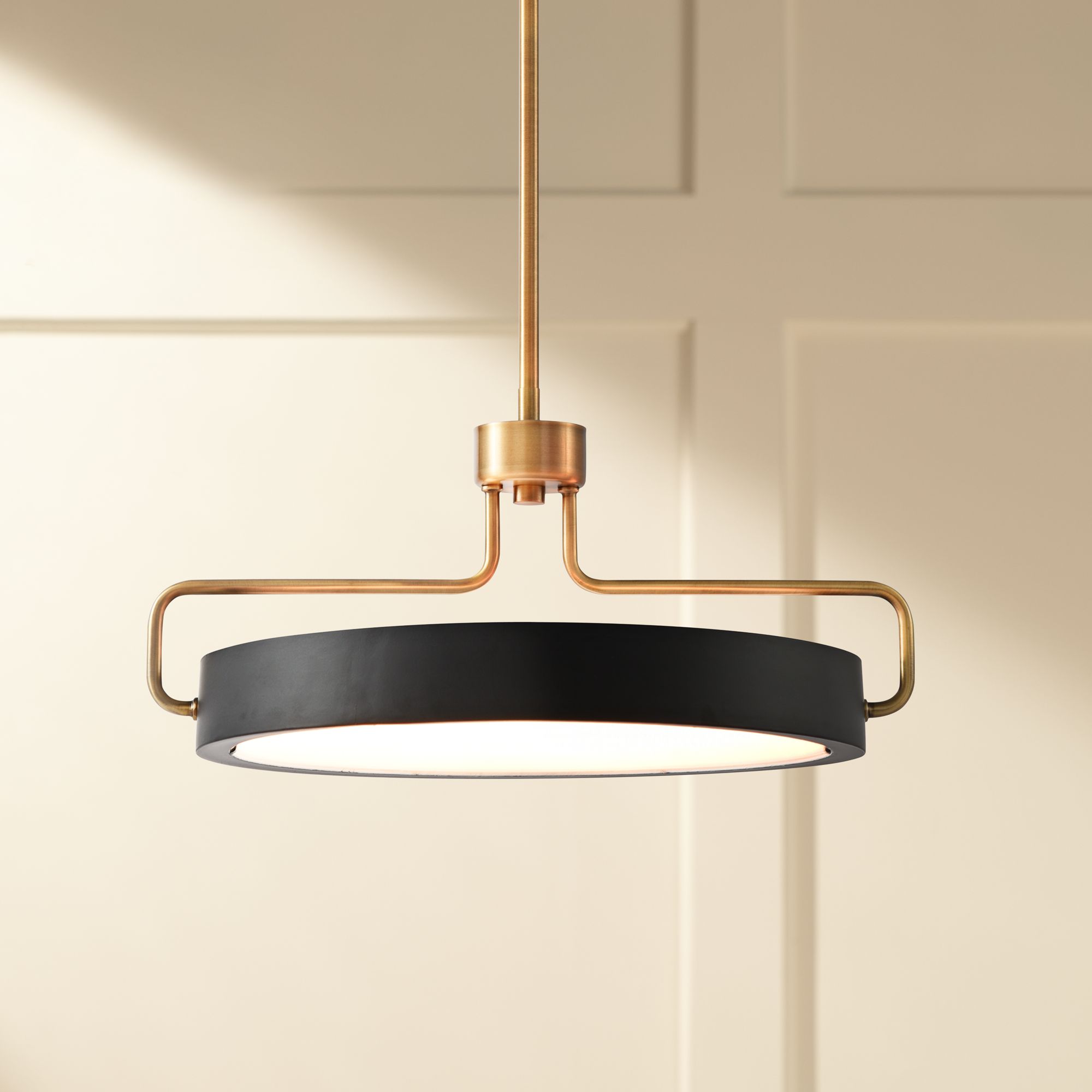 Brass and black store light fixtures