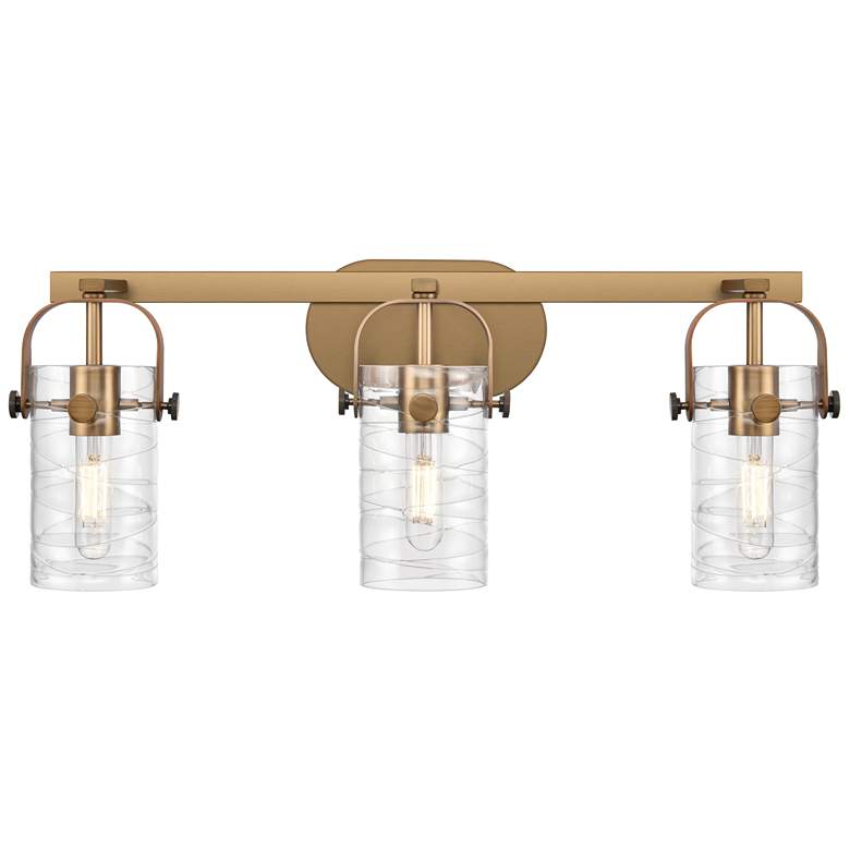 Image 1 Pilaster II Cylinder 25"W 3 Light Brushed Brass Bath Light w/ Swirl Sh
