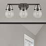 1_Pilaster II Sphere 26.5" Wide 3 Light Matte Black Bath Light w/ Clear