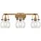 Pilaster II Sphere 26.5"W 3 Light Brushed Brass Bath Light w/ Clear Sh