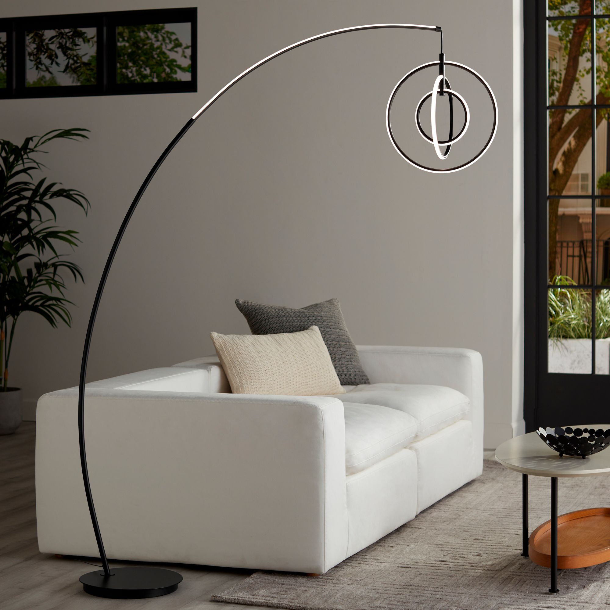 Possini Euro Allura Black 79" High 3-Ring LED Modern Arc Floor Lamp in scene