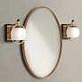 Watch A Video About the Possini Euro Carlyn Brass and Black Wall Sconces Set of 2