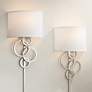 Possini Euro Circles Brushed Nickel Plug-In Wall Sconces Set of 2 in scene
