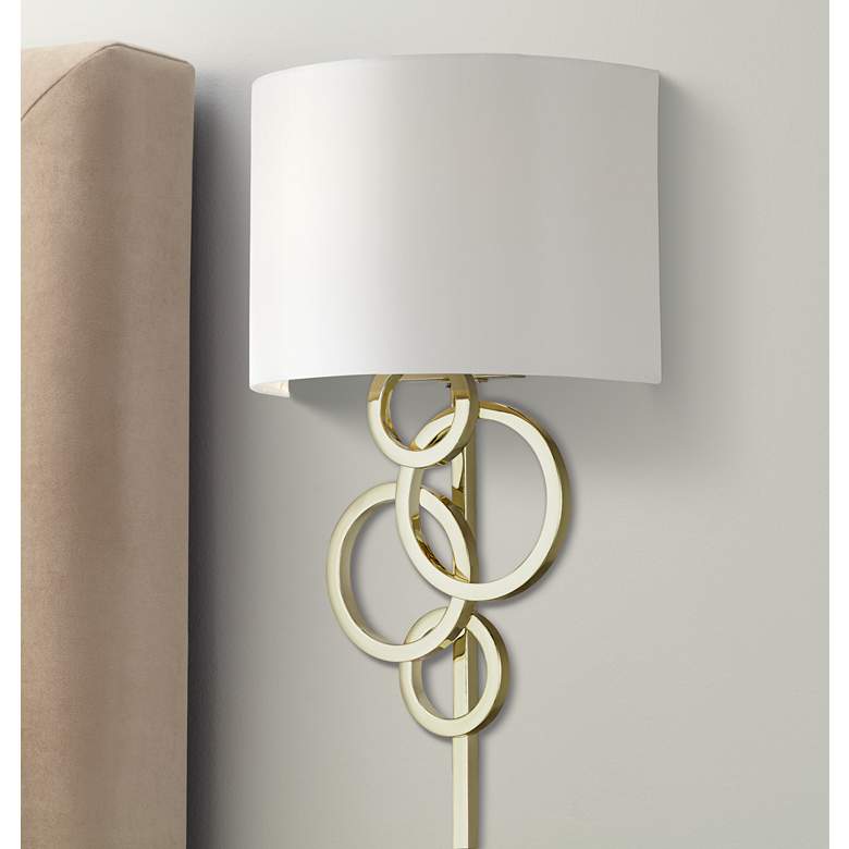 Image 1 Possini Euro Design Circles Polished Brass Plug-In Wall Lamp
