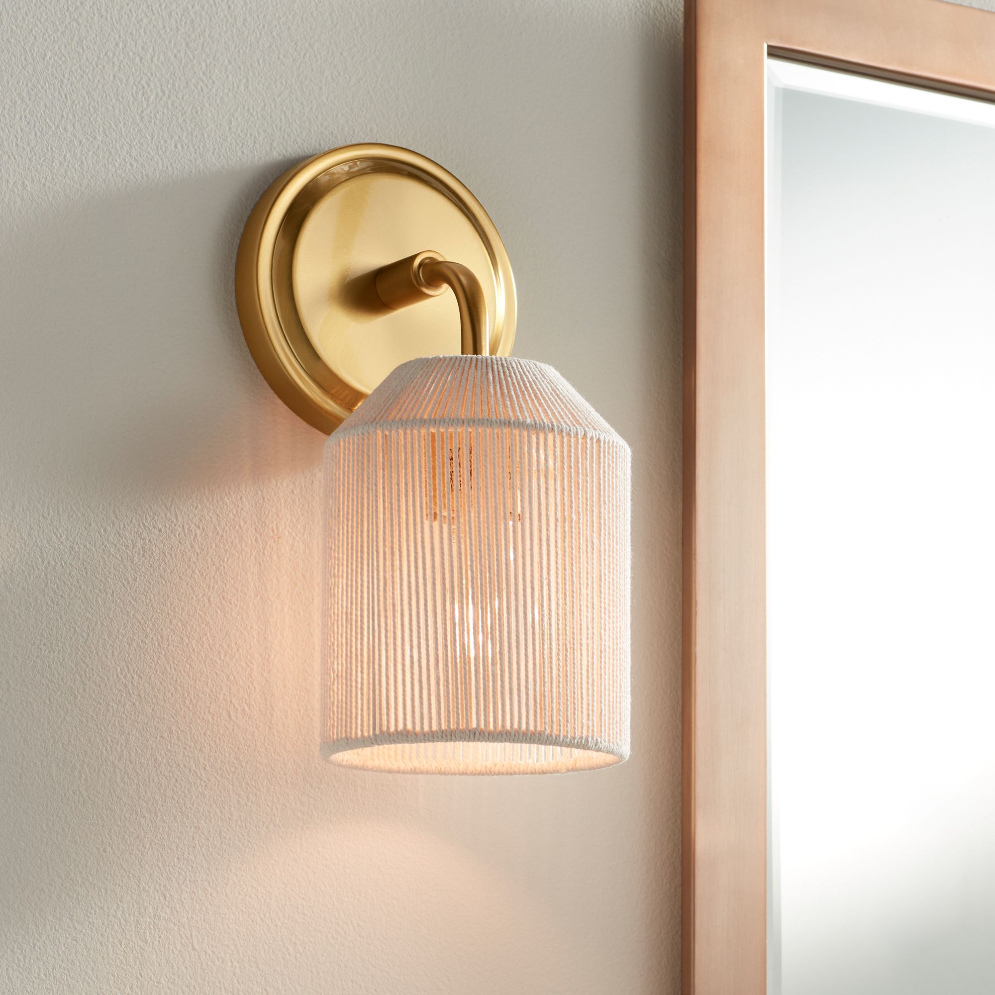 Watch A Video About the Possini Euro Jacob Gold and Natural Rope Wall Sconce