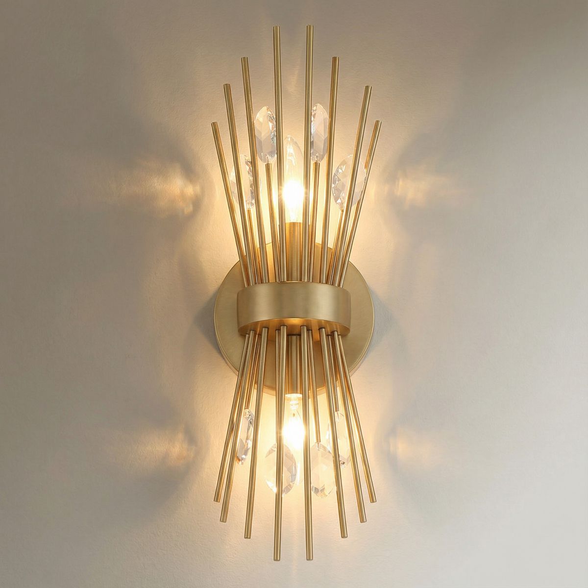 Watch A Video About the Possini Euro Janae Warm Brass Starburst 2 Light Wall Sconce