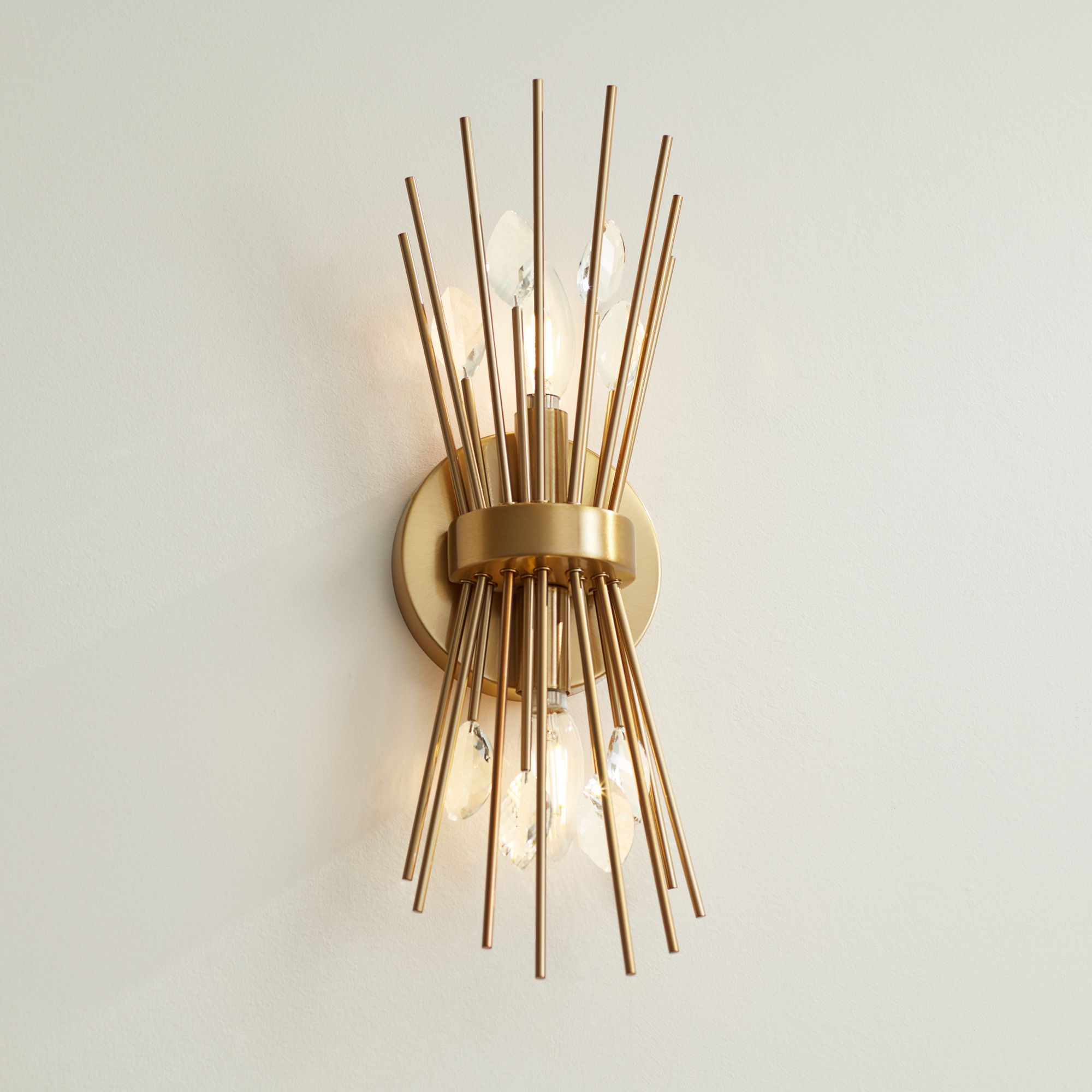 Watch A Video About the Possini Euro Janae Warm Brass Starburst 2 Light Wall Sconce