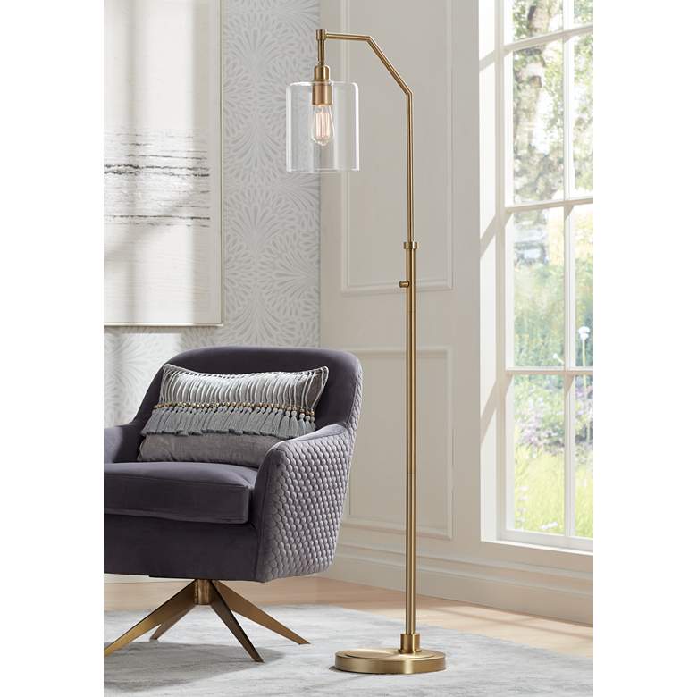 Image 1 Possini Euro Kipling Warm Gold Downbridge Arc Floor Lamp with Clear Glass
