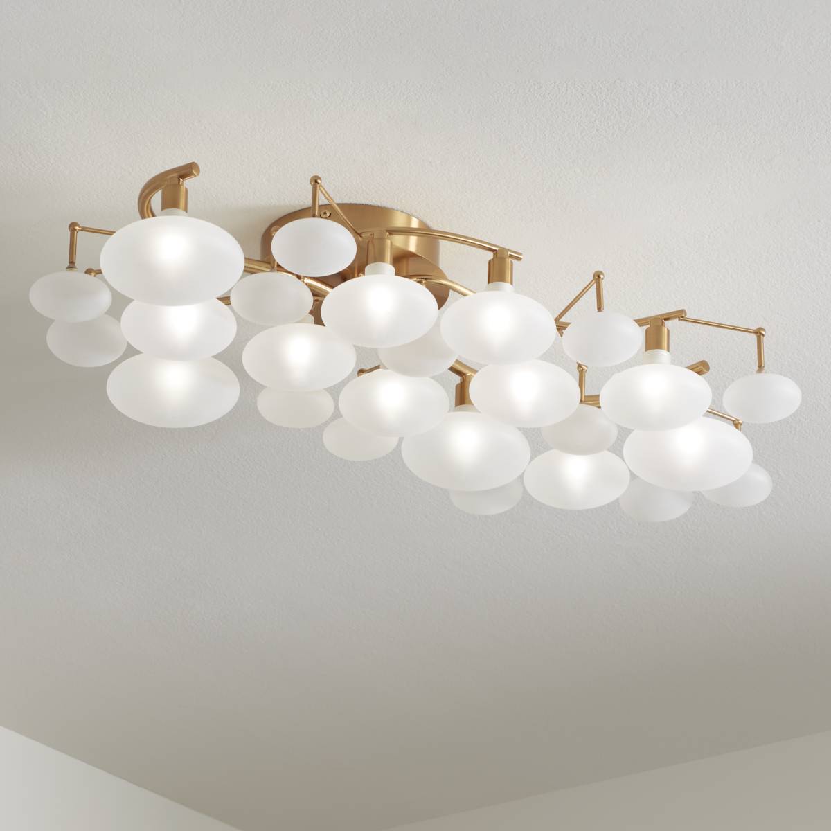 https://image.lampsplus.com/is/image/b9gt8/possini-euro-lilypad-30-and-one-quarter-warm-brass-frosted-glass-ceiling-light__281w0cropped.jpg?qlt=70&wid=1200&hei=1200&fmt=jpeg