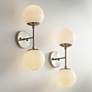 Possini Euro Oso 17 3/4" High Opal Glass and Nickel Sconces Set of 2 in scene