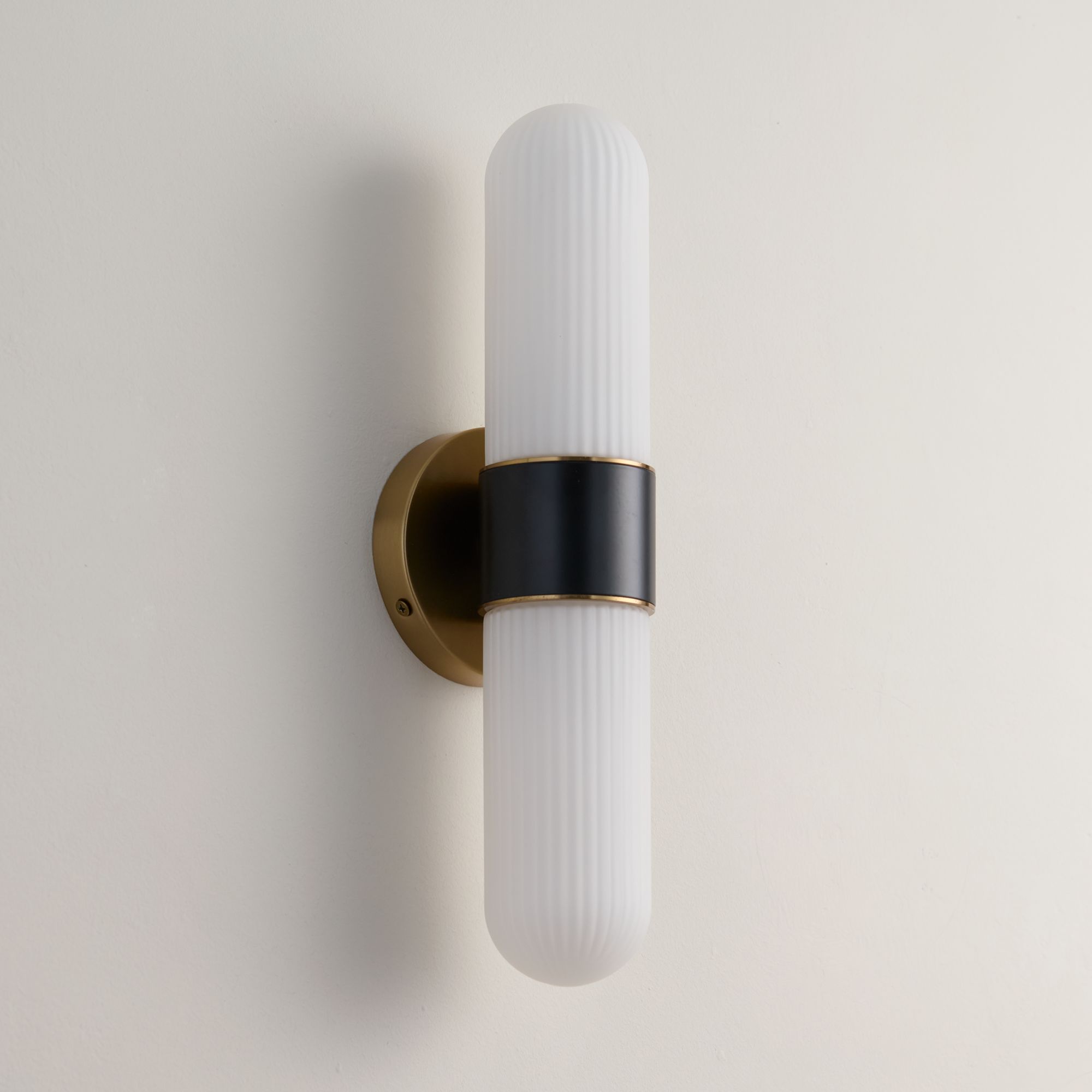 Watch A Video About the Possini Euro Riegel Black Gold Fluted Glass 2 Light Wall Sconce