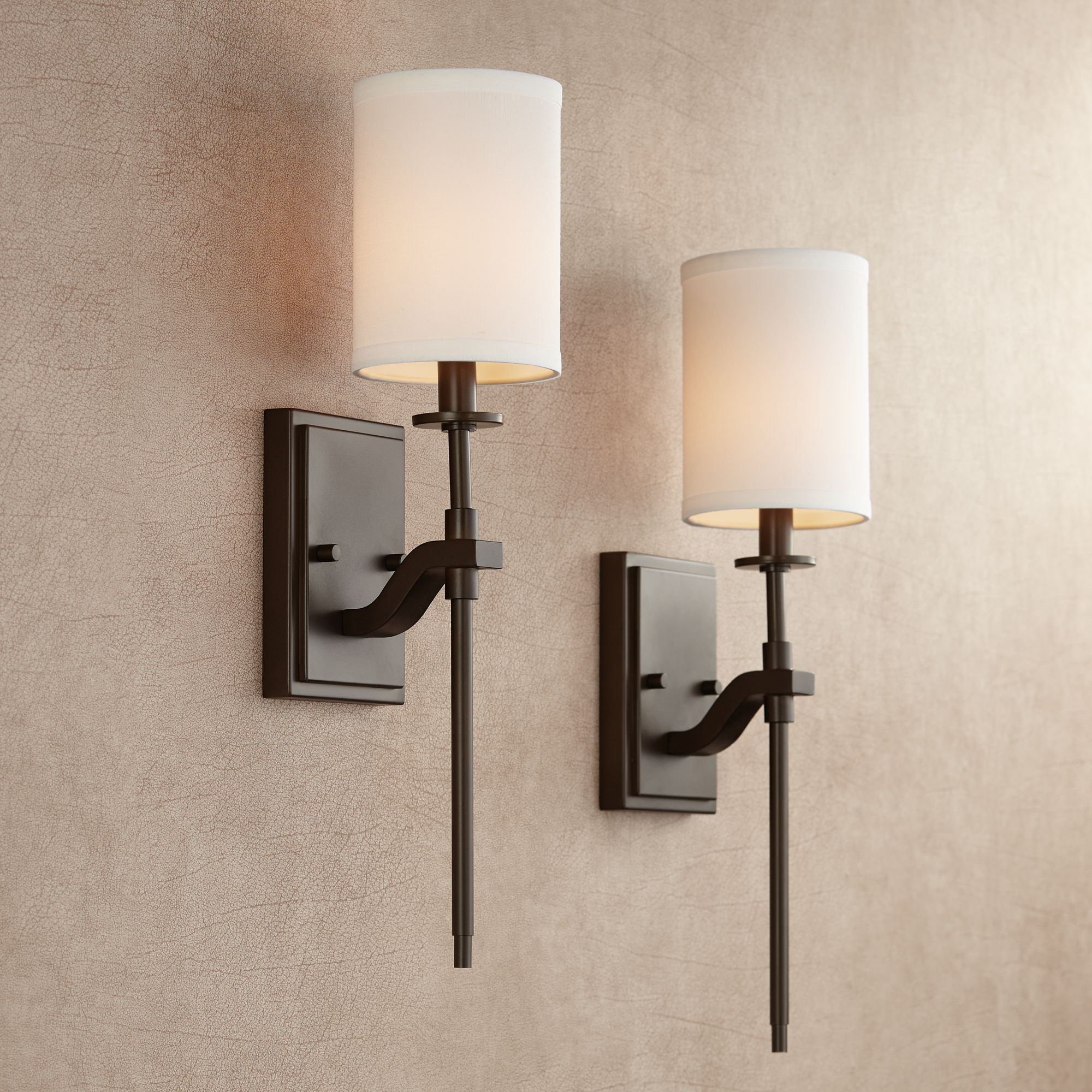 Brushed bronze store wall sconces