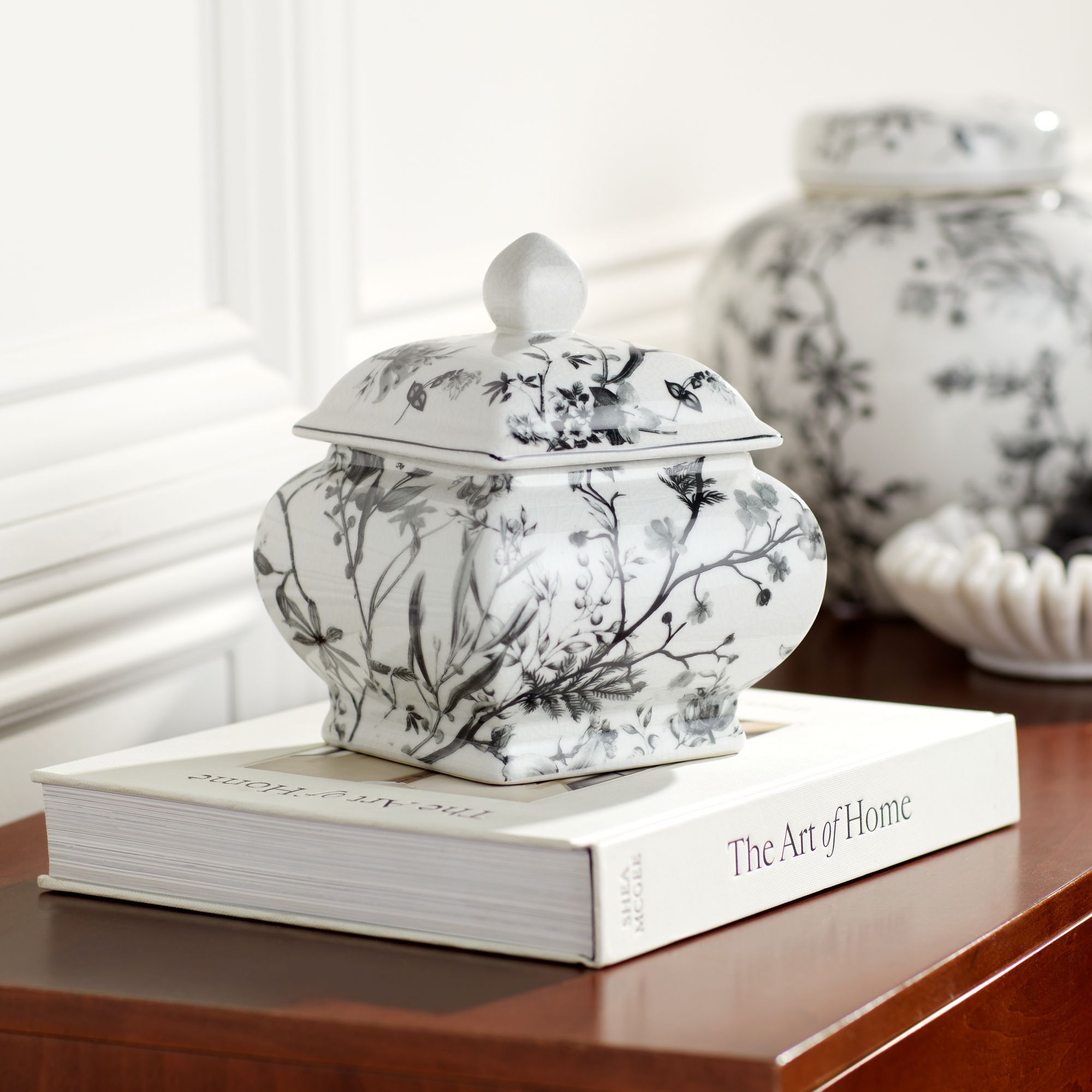 Prentiss Black and White 2-Piece Ceramic Ginger Jar Set in scene