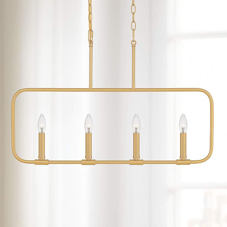 Image 1 Quoizel Abner 32 inch Wide Aged Brass 4-Light Linear Chandelier