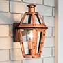 Quoizel Burdett 16" High Aged Copper Outdoor Wall Light in scene
