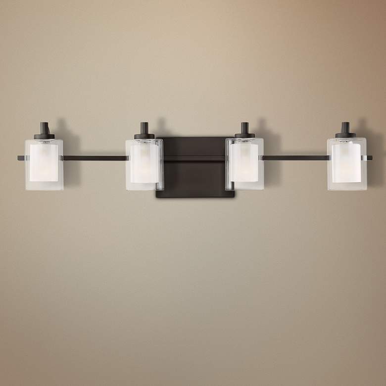 Image 1 Quoizel Kolt 29"W Western Bronze 4-Light Halogen Bath Light