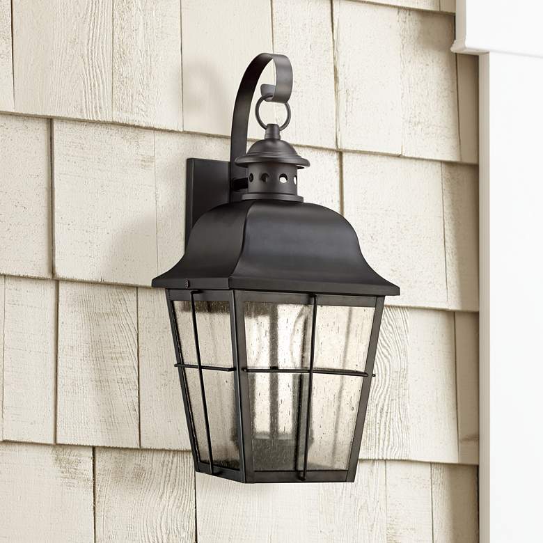 Image 1 Quoizel Millhouse 18" High Black and Seeded Glass Outdoor Wall Light