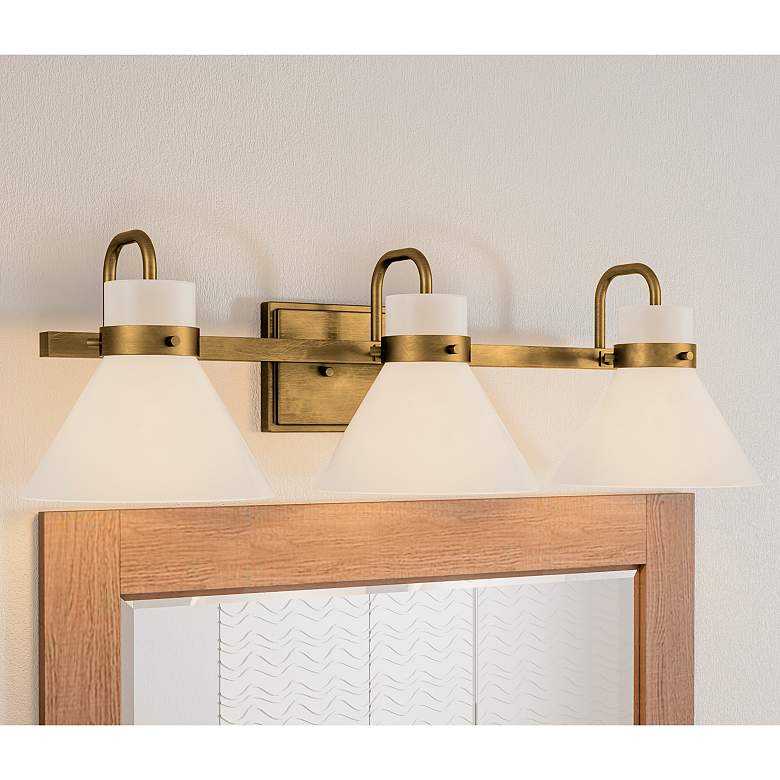 Image 1 Quoizel Regency 25 inch Wide Weathered Brass 3-Light Bath Light