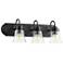 Quorum International 3LT Textured Black w Clear Seeded Glass Vanity Light
