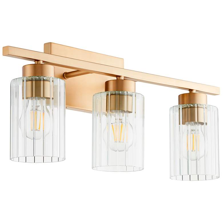 Image 1 Quorum International Ladin 2LT Aged Brass w Clear Fluted Glass Vanity Light