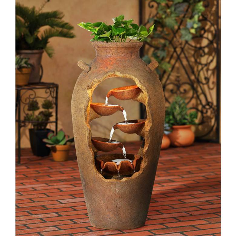 Image 1 Cascade 33" High Rustic Urn Fountain with Planter and LED Light in scene