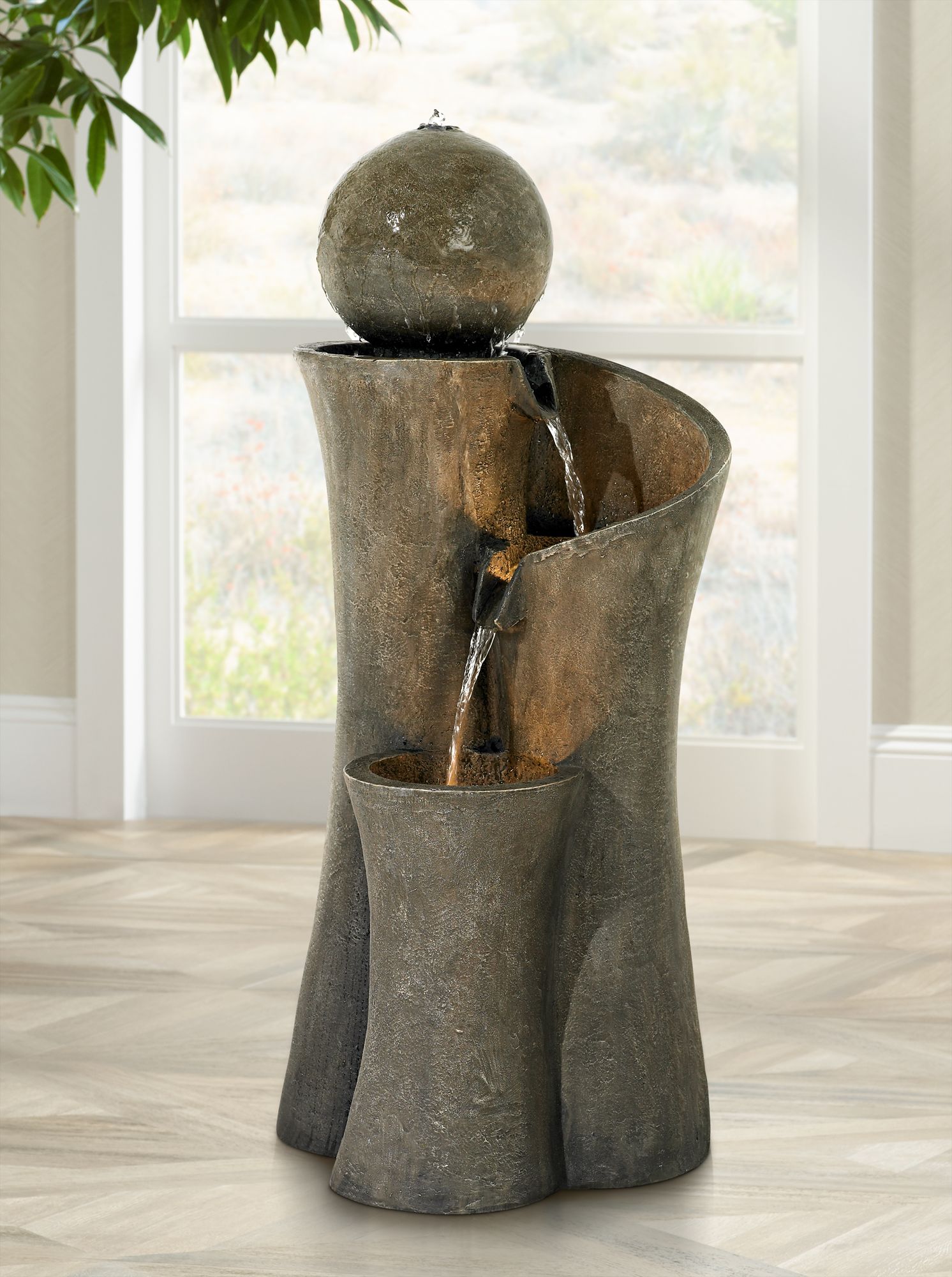 Watch A Video About the Modern Sphere Curve Cascading LED Fountain